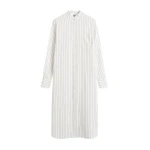 Toteme Dresses with minimalist design at Coveti