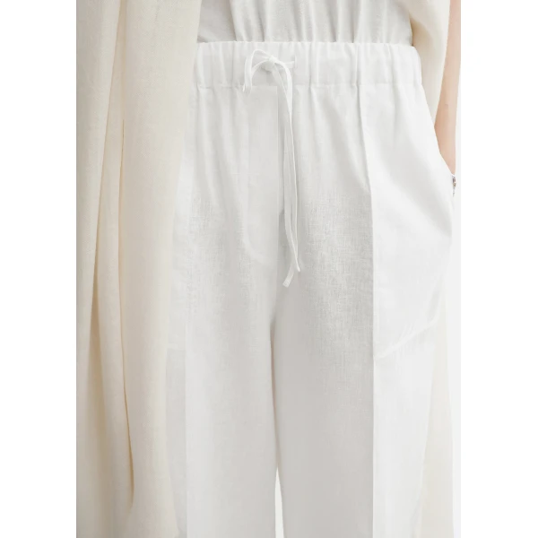 Toteme Pants with minimalist design at Coveti