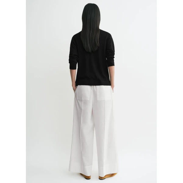 Toteme Knitwear with minimalist design at Coveti