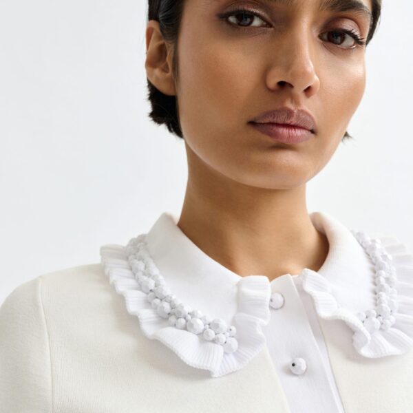 Essentiel Antwerp White ruffle fine-knit polo top with bead embellishments - Essentiel Antwerp Tops - Colorful Belgian Design - Shop at Coveti