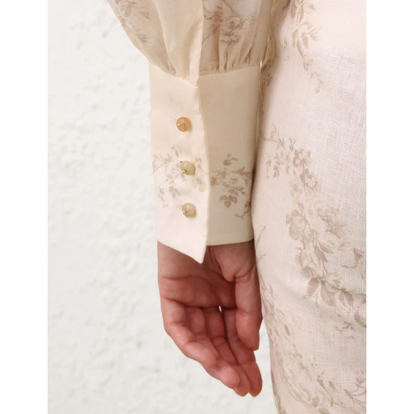 Elevate your elegance in this Zimmermann Tops   from the 2025 resort wear edit
