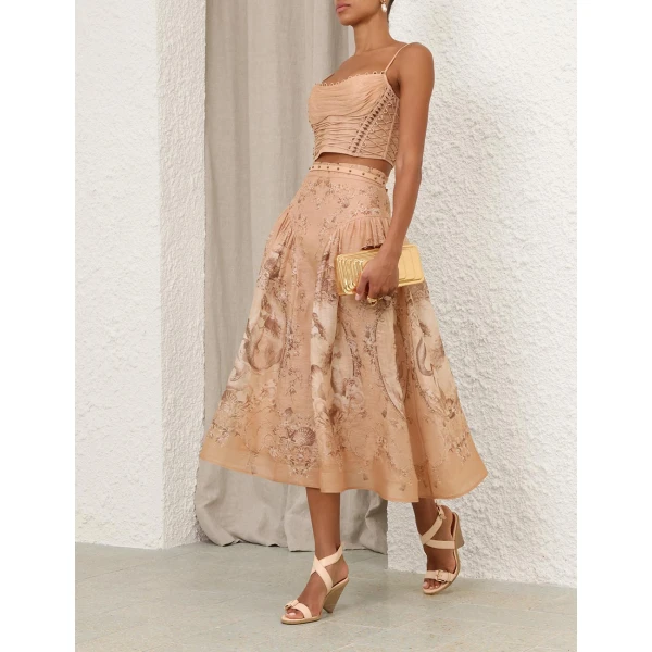 Elevate your elegance in this Zimmermann Tops   from the 2025 resort wear edit
