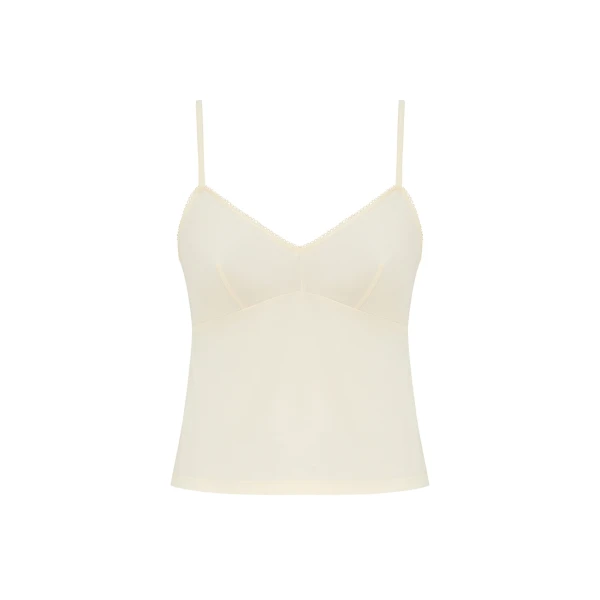 Elevate your elegance in this Zimmermann Tops   from the 2025 resort wear edit