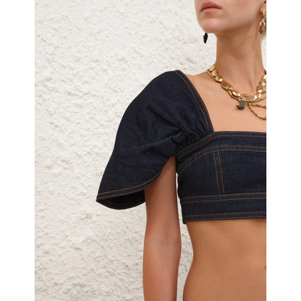 Elevate your elegance in this Zimmermann Tops   from the 2025 resort wear edit