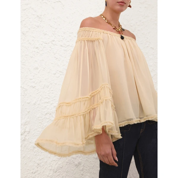 Elevate your elegance in this Zimmermann Tops   from the 2025 resort wear edit
