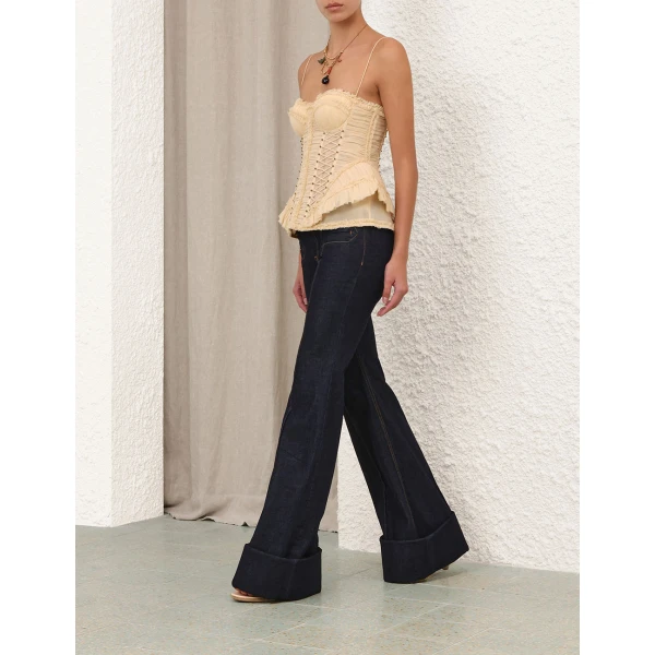 Elevate your elegance in this Zimmermann Tops   from the 2025 resort wear edit