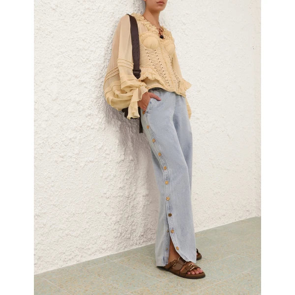 Elevate your elegance in this Zimmermann Tops   from the 2025 resort wear edit