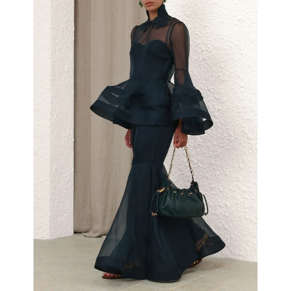 Elevate your elegance in this Zimmermann Tops   from the 2025 resort wear edit