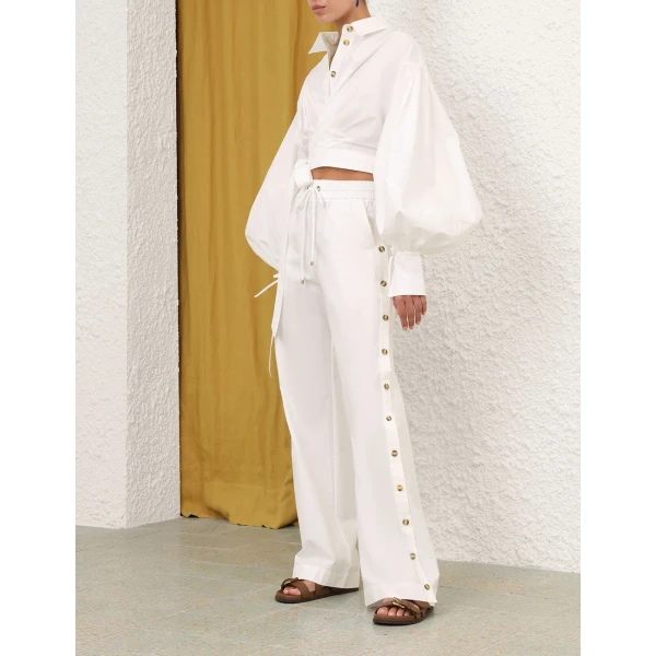 Elevate your elegance in this Zimmermann Tops   from the 2025 resort wear edit