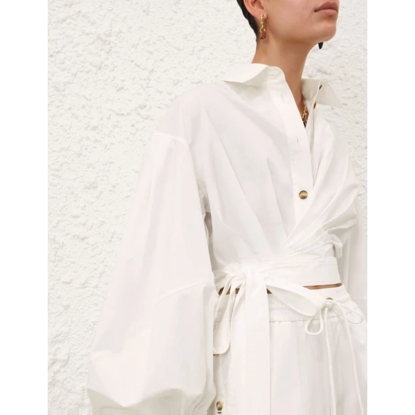 Elevate your elegance in this Zimmermann Tops   from the 2025 resort wear edit