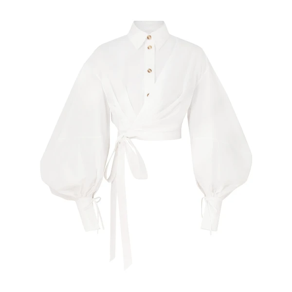 Elevate your elegance in this Zimmermann Tops   from the 2025 resort wear edit