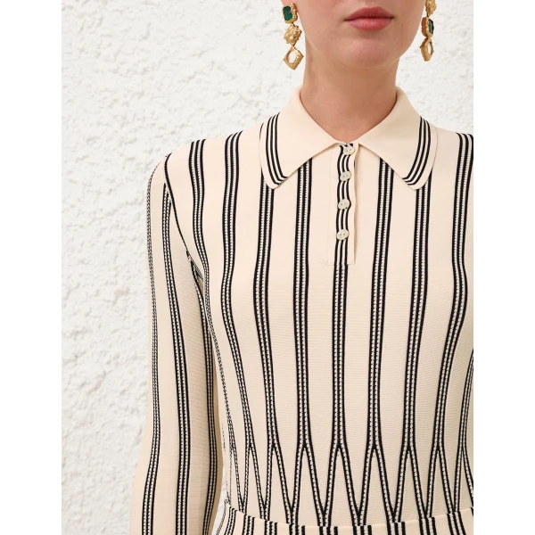 Elevate your elegance in this Zimmermann Tops   from the 2025 resort wear edit