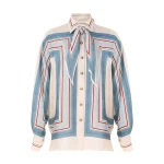 Elevate your elegance in this Zimmermann Tops   from the 2025 resort wear edit