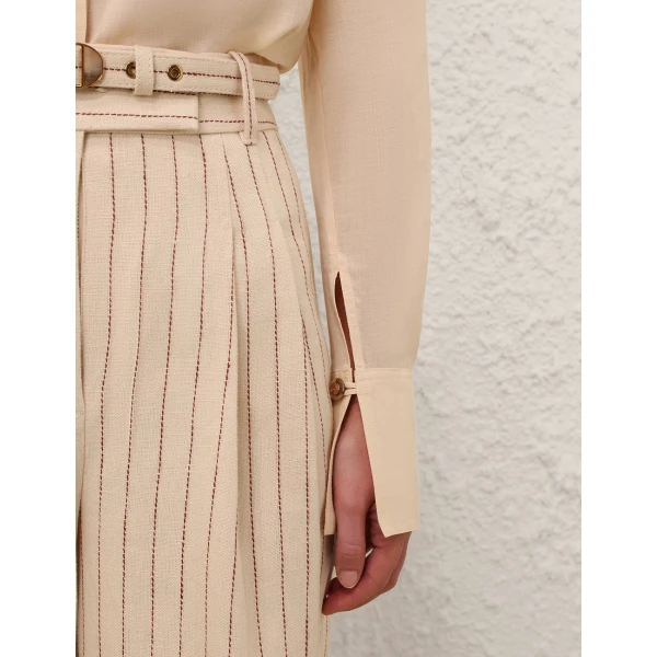 Elevate your elegance in this Zimmermann Tops   from the 2025 resort wear edit
