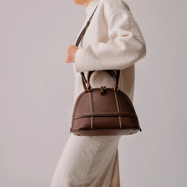 Mlouye Mini Flex Bag - Patent Bordeaux Bag a Architectural Leather Handbag in Red at Coveti Luxury