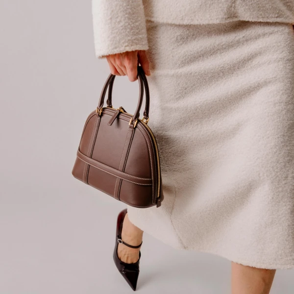 Mlouye Mini Flex Bag - Patent Bordeaux Bag a Architectural Leather Handbag in Red at Coveti Luxury