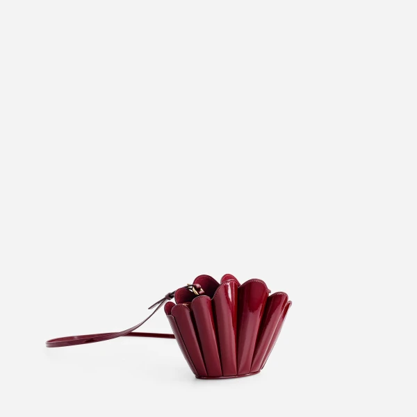 Mlouye Micro Seashell - Patent Bordeaux Bag a Architectural Leather Handbag in Red at Coveti Luxury