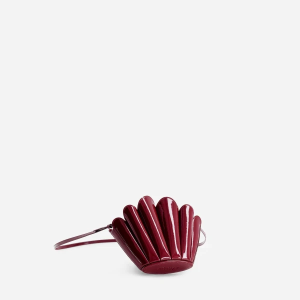 Mlouye Micro Seashell - Patent Bordeaux Bag a Architectural Leather Handbag in Red at Coveti Luxury