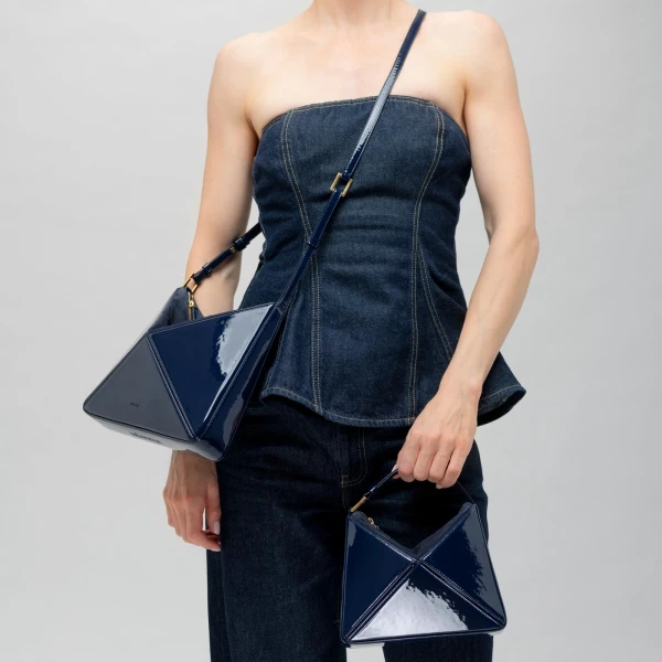 Mlouye Mini Flex Bag - Patent Navy Bag a Architectural Leather Handbag in Blue at Coveti Luxury