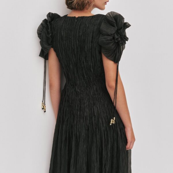 Aje Aus Dresses – structured silhouette with raw femininity from Coveti