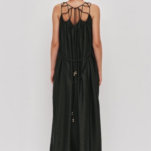 Aje Aus Dresses – structured silhouette with raw femininity from Coveti