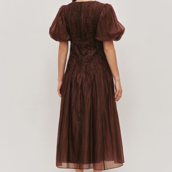Aje Aus Dresses – structured silhouette with raw femininity from Coveti