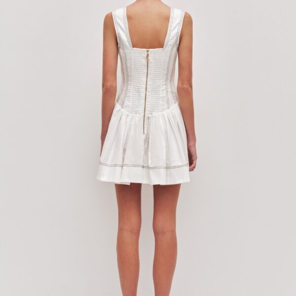 Aje Aus Dresses – structured silhouette with raw femininity from Coveti