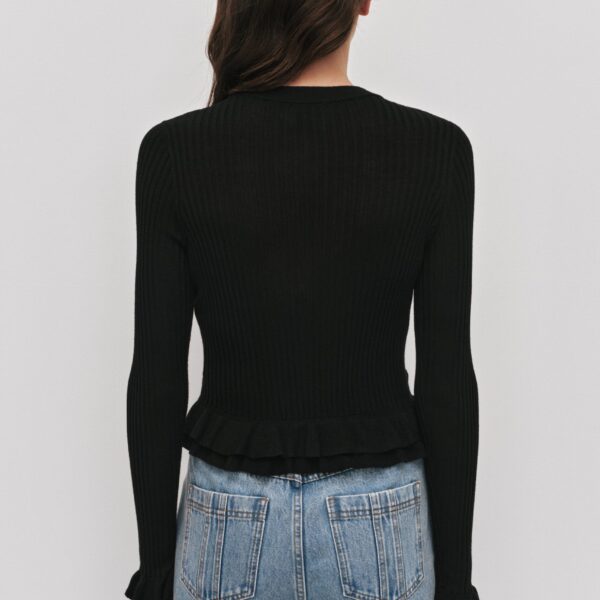 Aje clothing Aus Knitwear – structured silhouette with raw femininity from Coveti