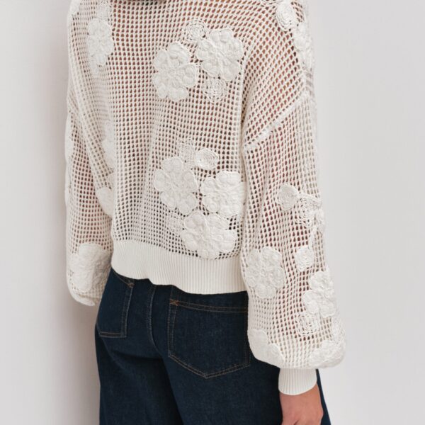 Aje Aus Knitwear – structured silhouette with raw femininity from Coveti