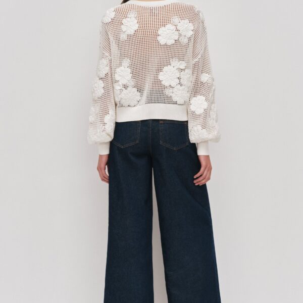 Aje clothing Aus Knitwear – structured silhouette with raw femininity from Coveti