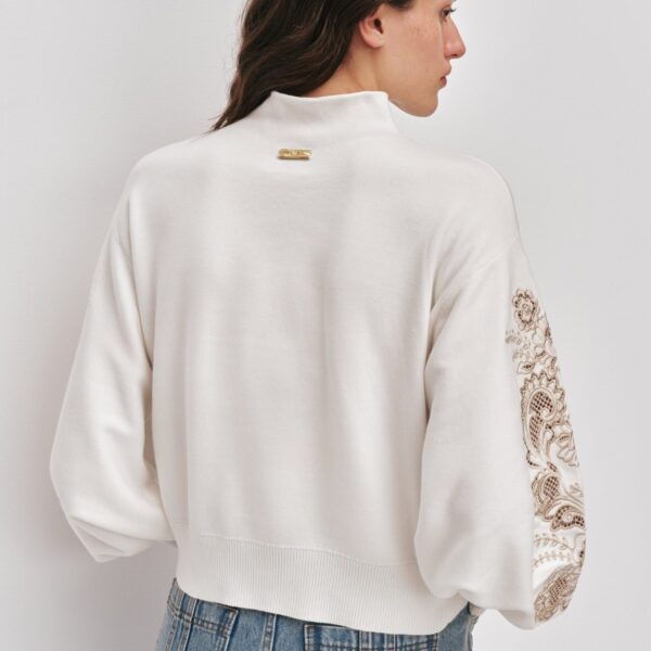 Aje Aus Knitwear – structured silhouette with raw femininity from Coveti