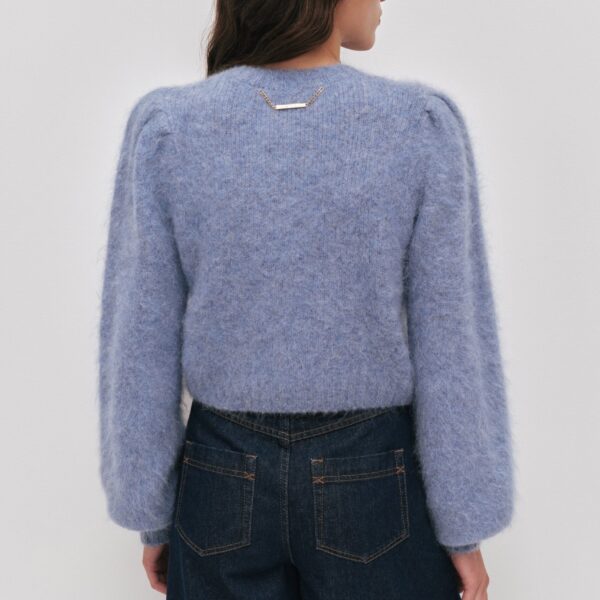 Aje Aus Knitwear – structured silhouette with raw femininity from Coveti