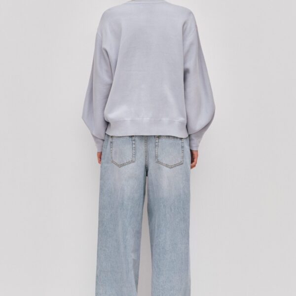 Aje clothing Aus Knitwear – structured silhouette with raw femininity from Coveti