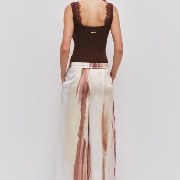 Aje Aus Pants – structured silhouette with raw femininity from Coveti