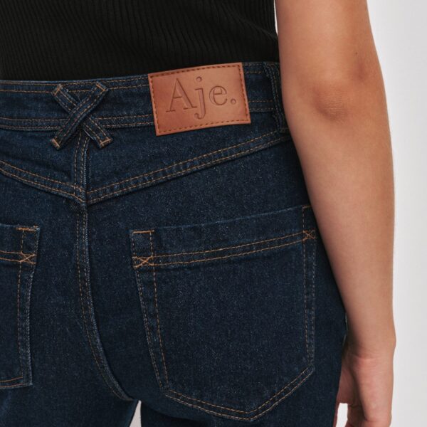 Aje clothing Aus Pants – structured silhouette with raw femininity from Coveti