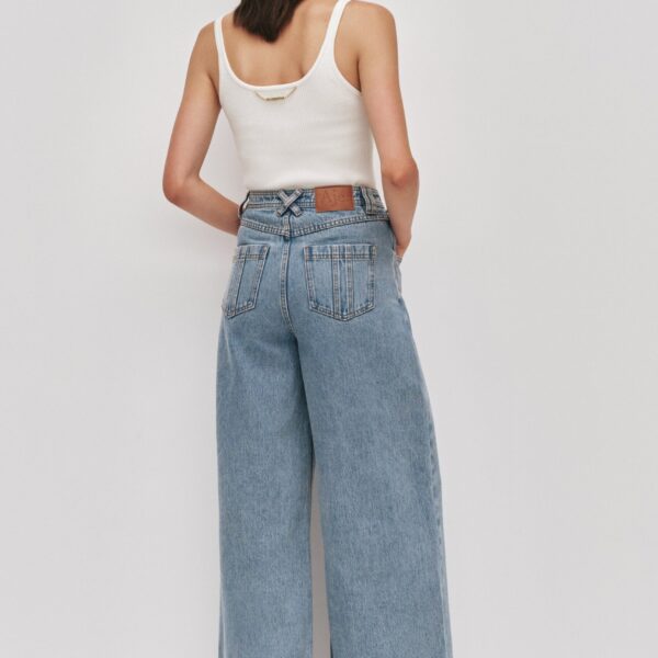 Aje clothing Aus Pants – structured silhouette with raw femininity from Coveti