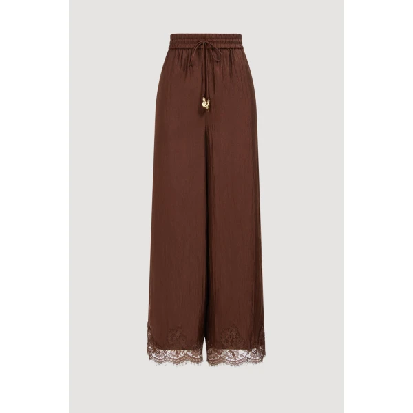 Aje clothing Aus Pants – structured silhouette with raw femininity from Coveti