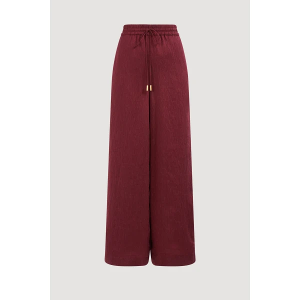 Aje clothing Aus Pants – structured silhouette with raw femininity from Coveti