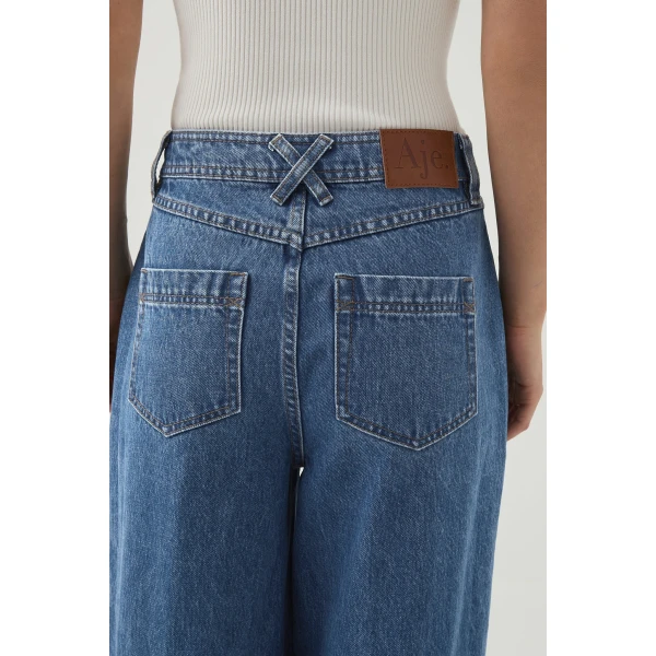 Aje Aus Pants – structured silhouette with raw femininity from Coveti