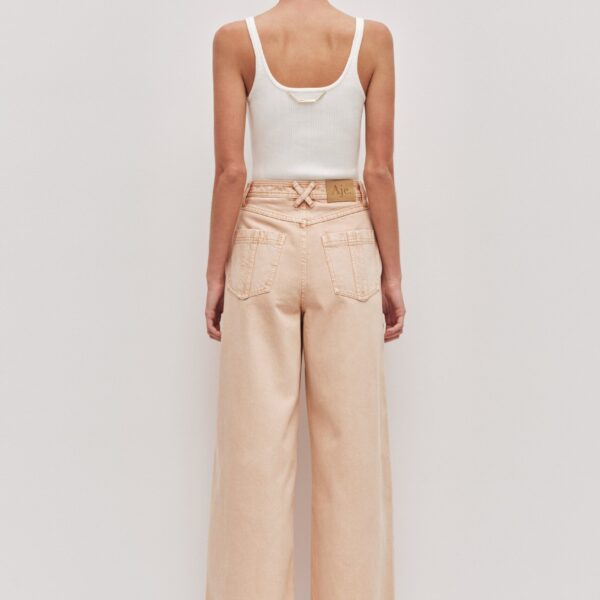 Aje clothing Aus Pants – structured silhouette with raw femininity from Coveti