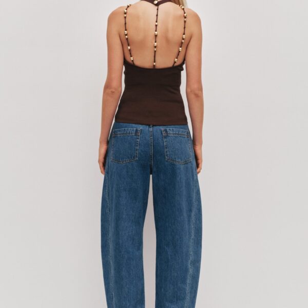 Aje clothing Aus Tops – structured silhouette with raw femininity from Coveti