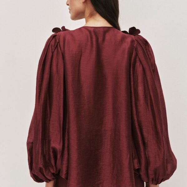 Aje clothing Aus Tops – structured silhouette with raw femininity from Coveti