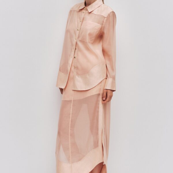 Aje Aus Tops – structured silhouette with raw femininity from Coveti