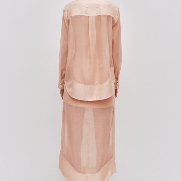 Aje clothing Aus Tops – structured silhouette with raw femininity from Coveti