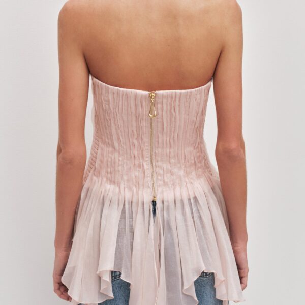 Aje Aus Tops – structured silhouette with raw femininity from Coveti