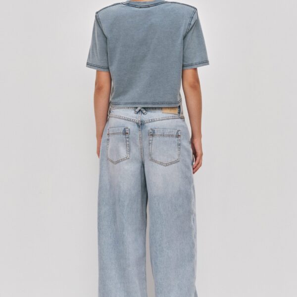 Aje clothing Aus Tops – structured silhouette with raw femininity from Coveti