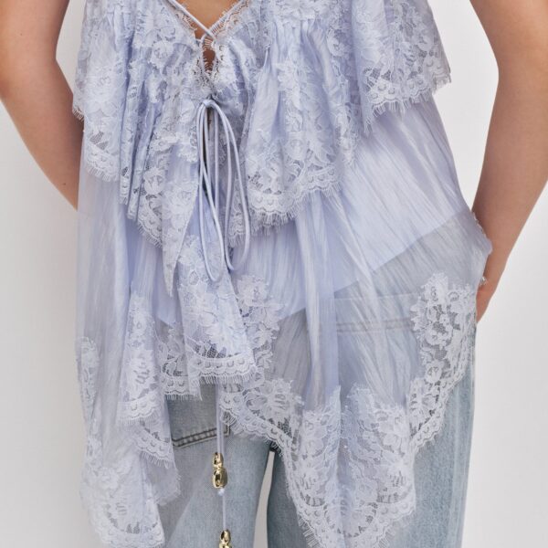 Aje Aus Tops – structured silhouette with raw femininity from Coveti