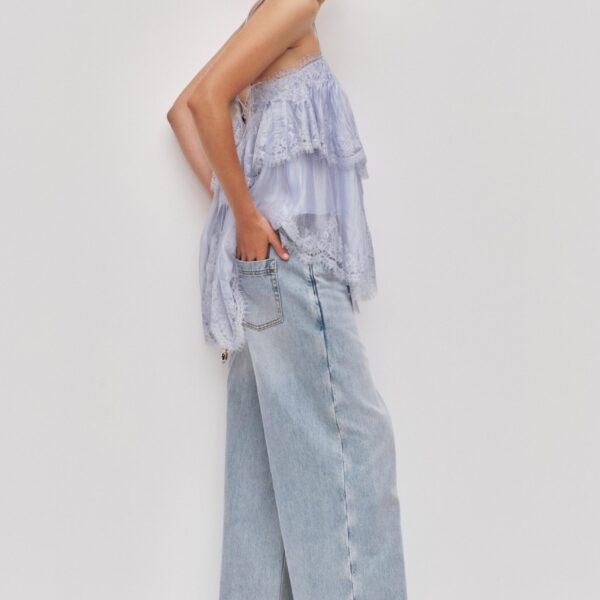 Aje clothing Aus Tops – structured silhouette with raw femininity from Coveti