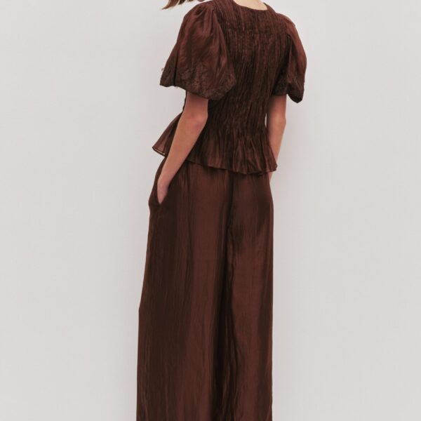 Aje clothing Aus Tops – structured silhouette with raw femininity from Coveti