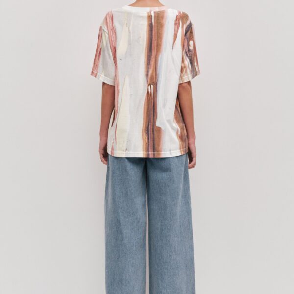 Aje Aus Tops – structured silhouette with raw femininity from Coveti